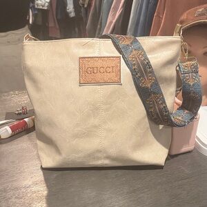 Cream Shoulder Bag with Patterned Strap